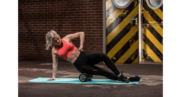 Masážní válec Foam Roller TUNTURI 33 cm / 13 cm oranžový