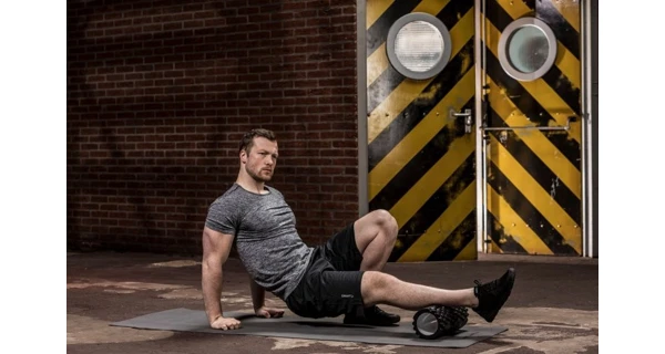 Masážní válec Foam Roller TUNTURI 33 cm / 13 cm oranžový